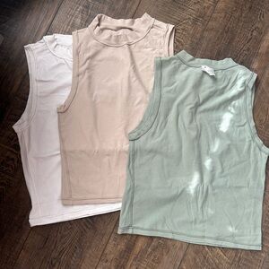 Sleeveless Tops in White, Beige, and Green